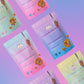 Six Caramunchies pouches on a pink and purple gradient